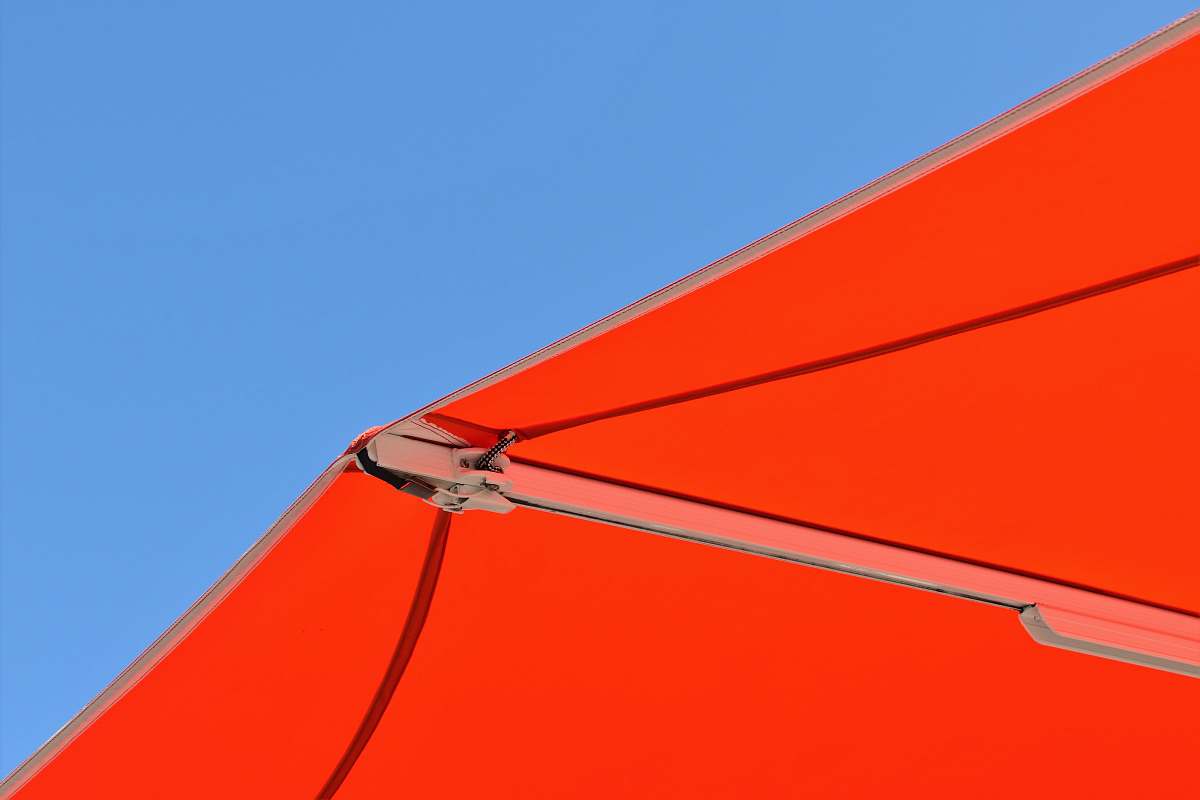 leisure activities orange parasol gliding